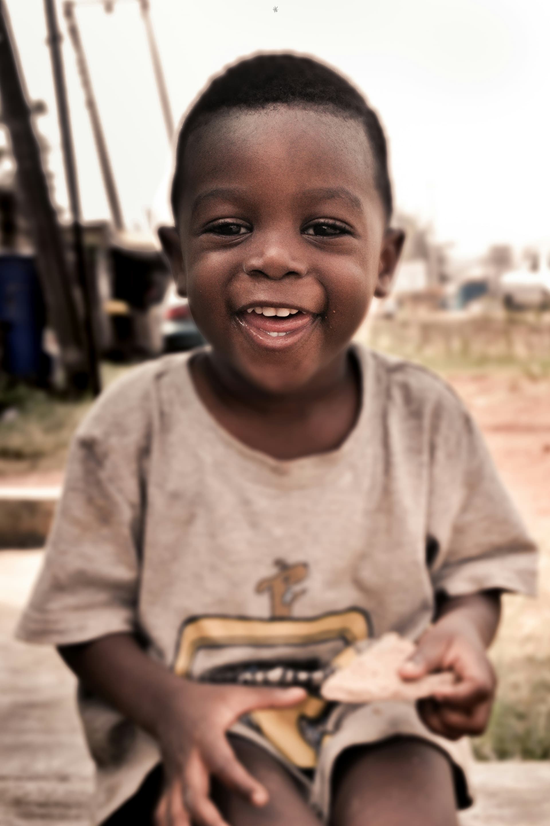 A smiling child representing BoursePad's mission to keep children in school